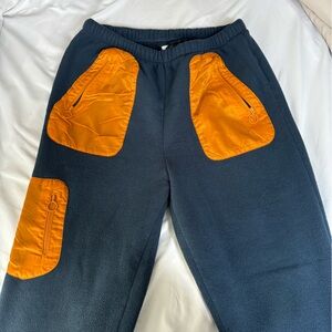 Blue and orange adidas fleece sweatpants